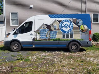 Vehicle wraps in Harrisburg PA highlighting company branding.